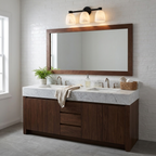 This Clérachic bar sconce in black finish hangs above a rectangular mirror over a dark walnut vanity.