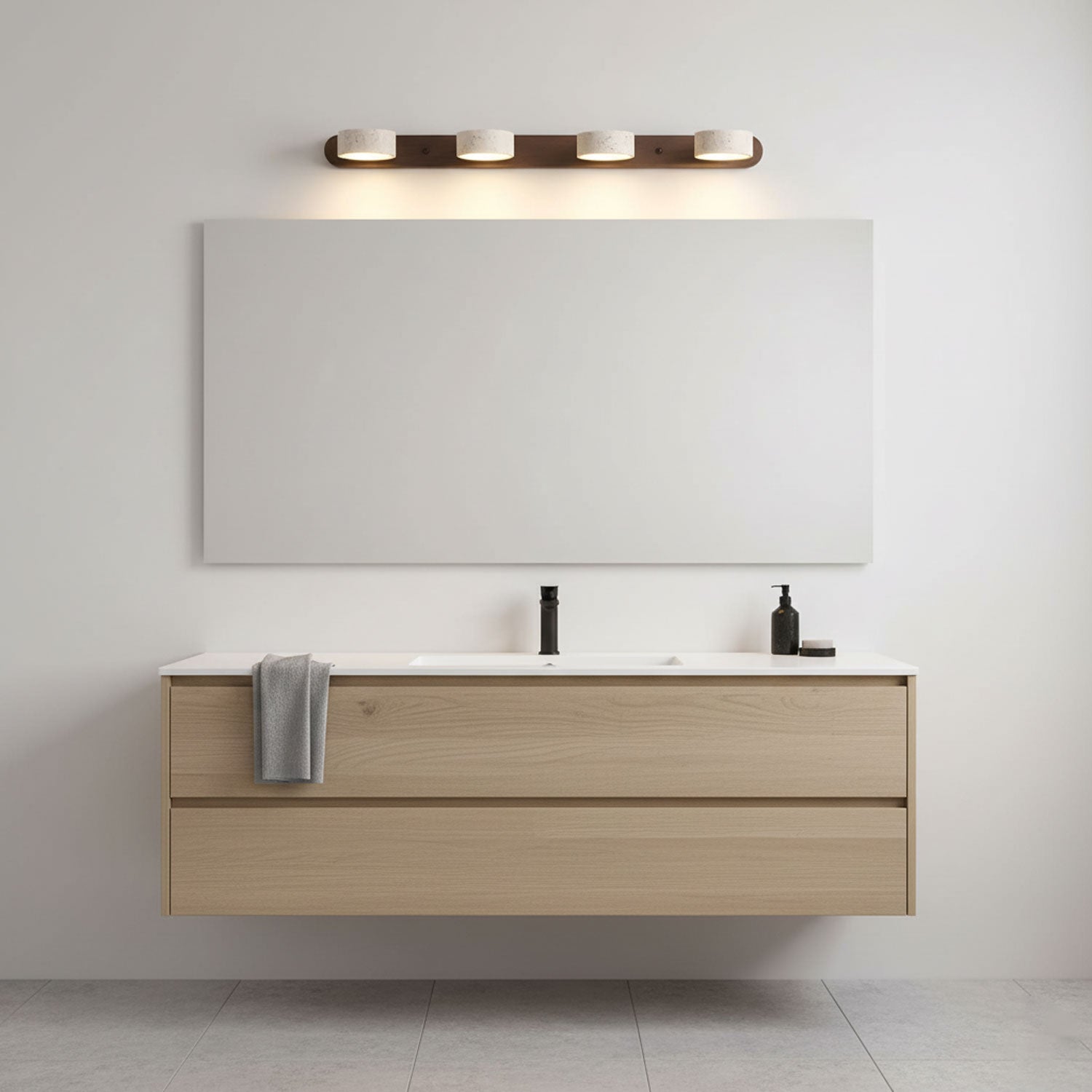 Travertine duo wall light glowing in a styled interior setting