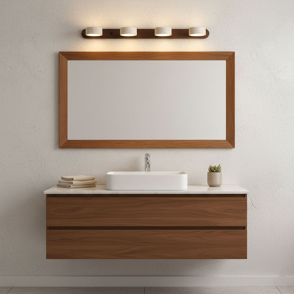 Travertine wall light glowing warmly in a refined interior