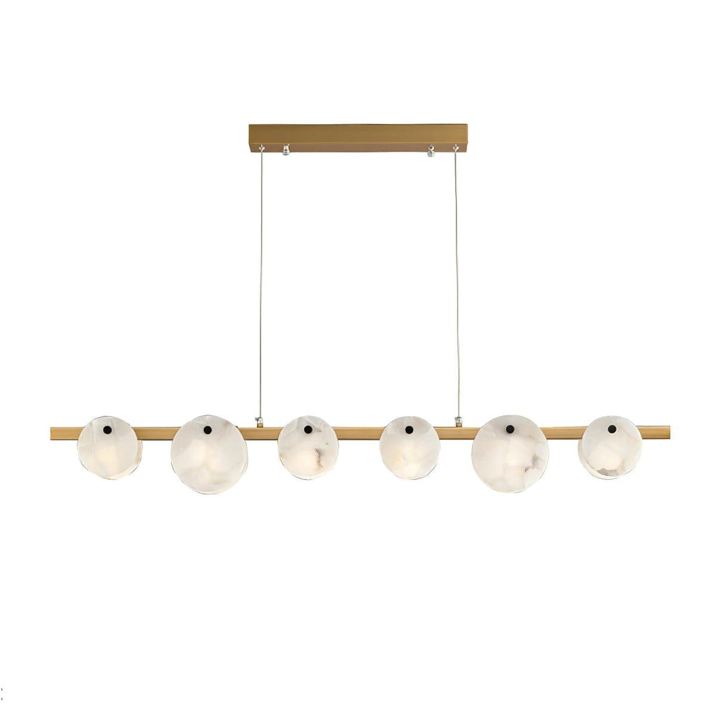 The six-light brass version on white, discs spaced evenly along the full length of the bar.