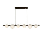 The six-light black-framed version on white, alabaster discs strung along a matte black bar.