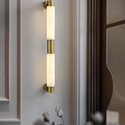 Alraei buisvormige albasten wandlamp, één tot drie lichtpunten, messing- of zwarte afwerking