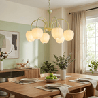 Tulip chandelier glowing in a fresh natural interior