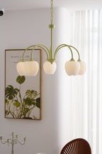 Tulip chandelier glowing softly in a calm interior