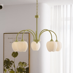 Tulip chandelier shown with white glass blooms close up