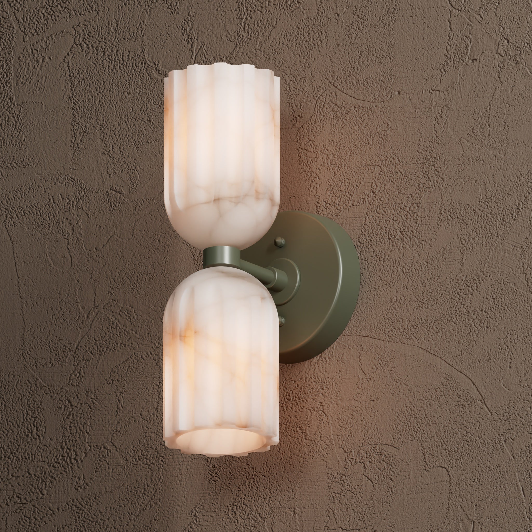 Close-up of the sage green sconce, showing the fluted alabaster shades and their amber veining