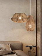 Beside a striped curtain in a bedroom, two jute rope Clérachic pendants pair a bowl-cone and teardrop shade.