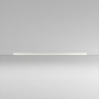 This Clérachic ceiling light in white lies flat and unlit, its profile visible against a soft grey-to-white gradient.