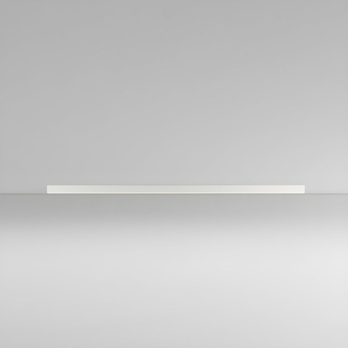 This Clérachic ceiling light in white lies flat and unlit, its profile visible against a soft grey-to-white gradient.