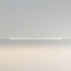 This Clérachic ceiling light in white lies unlit against a warm, softly graduated backdrop from grey to cream.