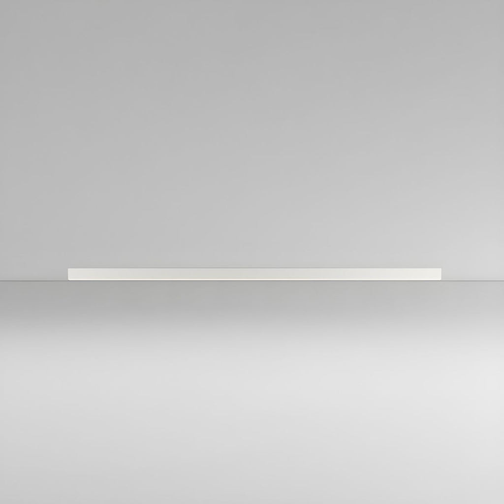 This Clérachic ceiling light in white lies flat and unlit, its slim profile catching light on a plain grey backdrop.