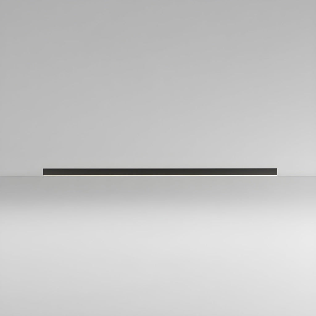 This Clérachic ceiling light in black lies flat and unlit, its slim profile visible against a plain grey backdrop.