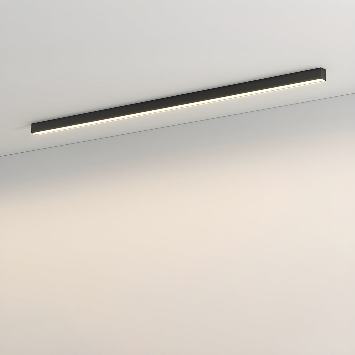 This Clérachic ceiling light, a slim black bar, sits unlit against a plain wall and ceiling corner.
