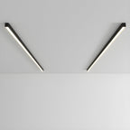 Two black Clérachic ceiling lights angle apart in a V shape, unlit against a plain grey backdrop.