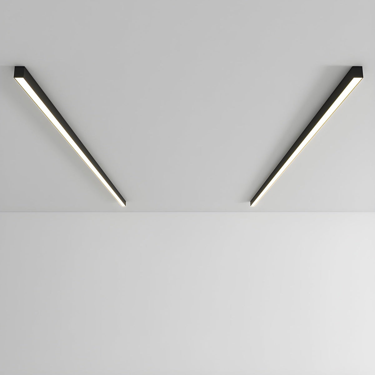 Two black Clérachic ceiling lights angle apart in a V shape, unlit against a plain grey backdrop.