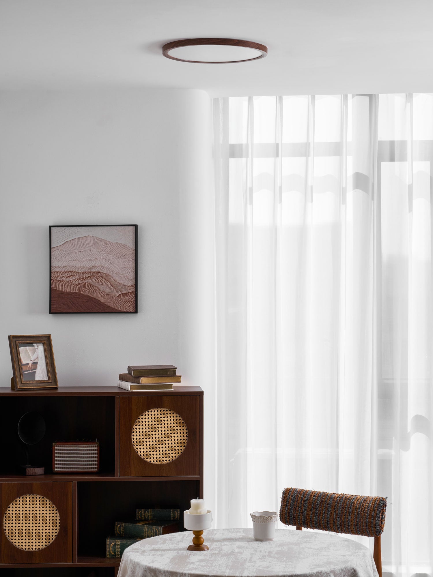 Walnut wood-grain ceiling light mounted flush above a seating area