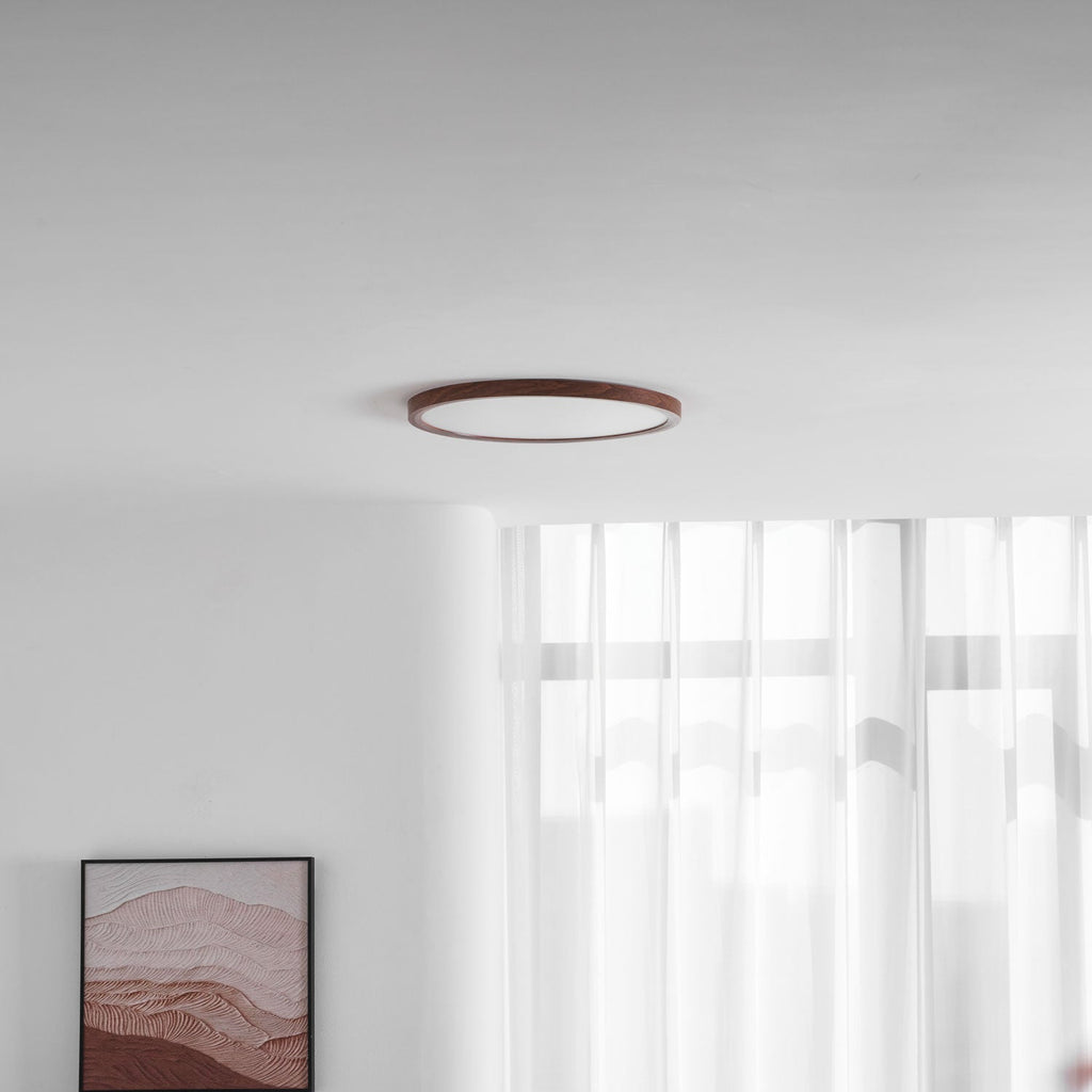 Warm-glow round ceiling light with soft acrylic diffuser panel