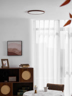 Ultra-thin ceiling light shown close up with wood-grain detail