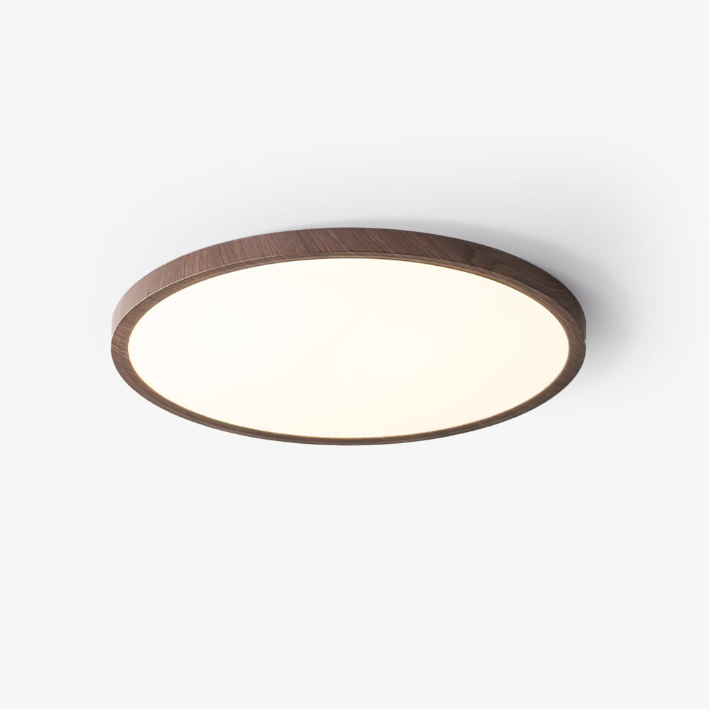 Ultra-slim round ceiling light with walnut wood-grain finish mounted overhead