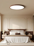 Flush-mount ceiling light with white acrylic diffuser and wood-grain edge