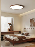 Warm LED ceiling light casting an even glow in a modern room