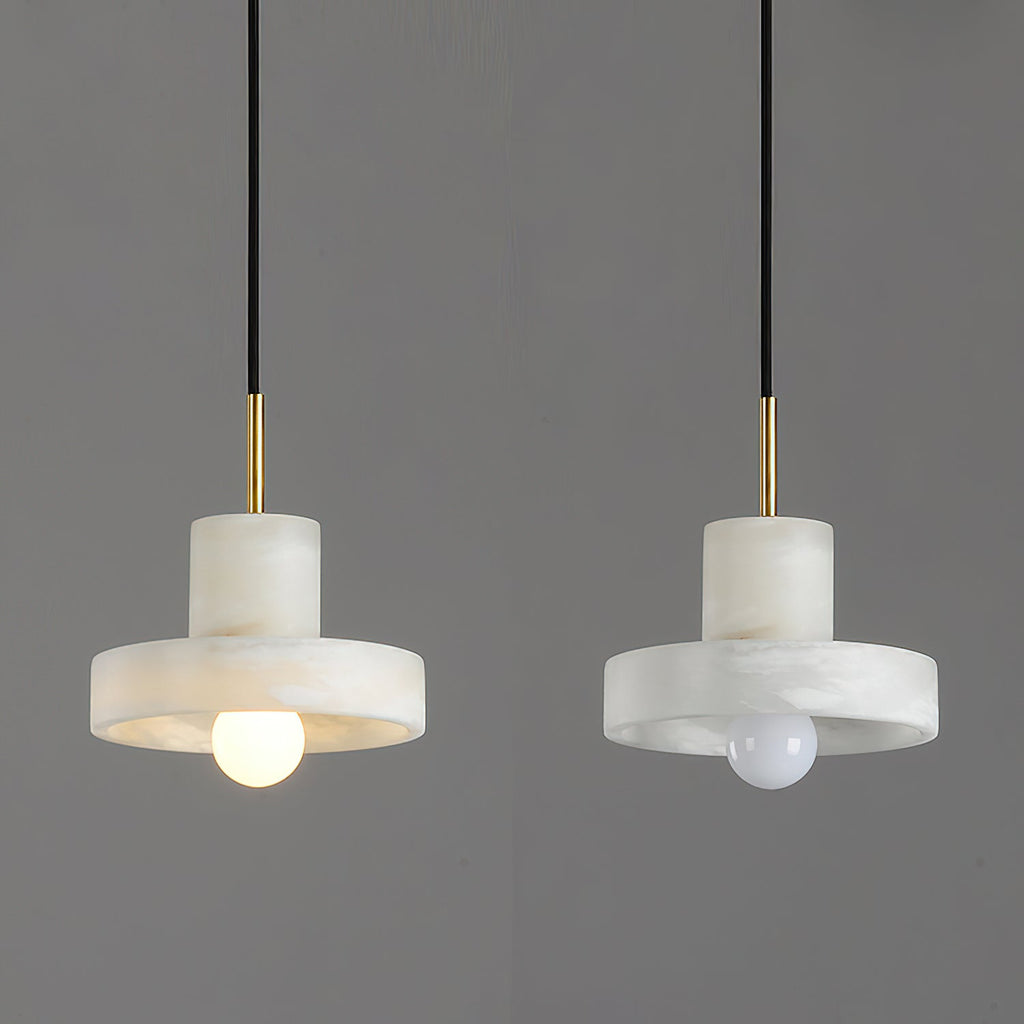 Two Ritta hat-shaped pendants side by side, one switched on and one off, against grey.