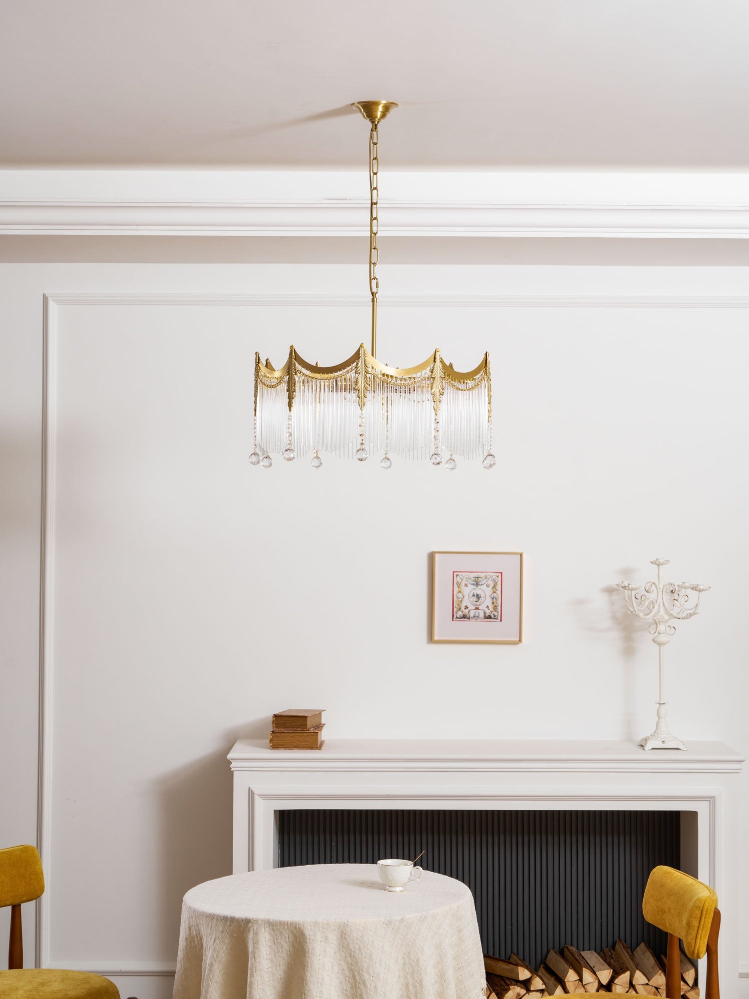 Multi-light copper chandelier with clear glass shades casting a warm glow