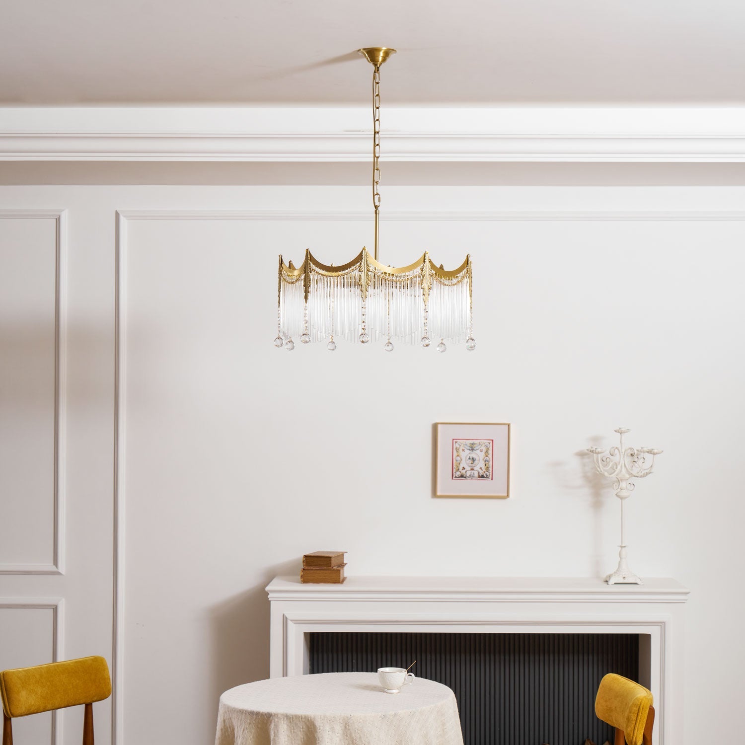 Copper-finish chandelier with clear glass shades suspended from a ceiling