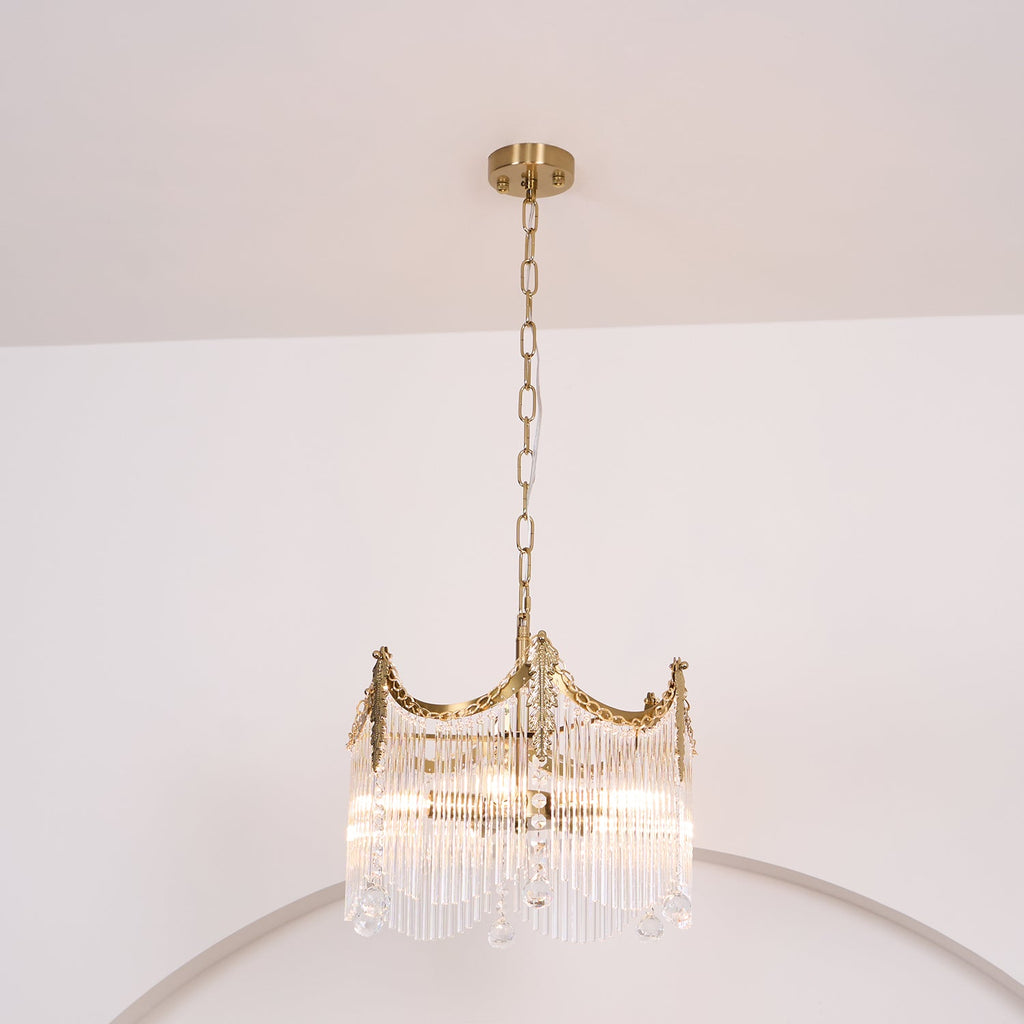 Detail of copper finish and clear glass shade arrangement on the chandelier