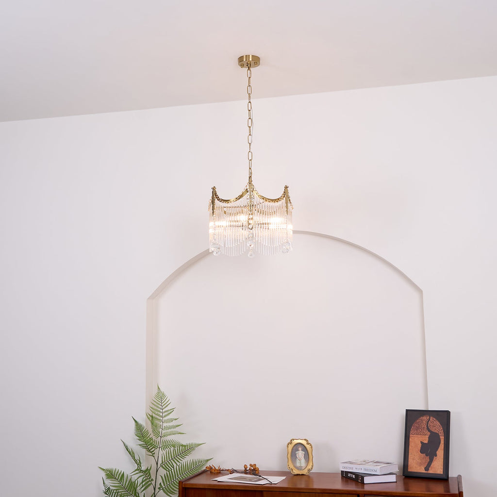 Copper-finish chandelier with clear glass shades shown in full detail