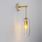 Wall-mounted glass lamp with slim metal arm shown close up