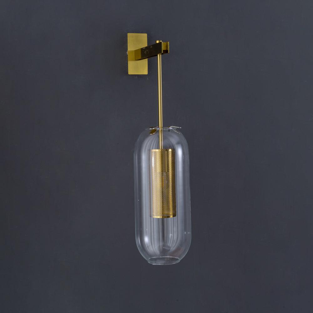 Wall lamp with metal arm and glass shade lighting a hallway
