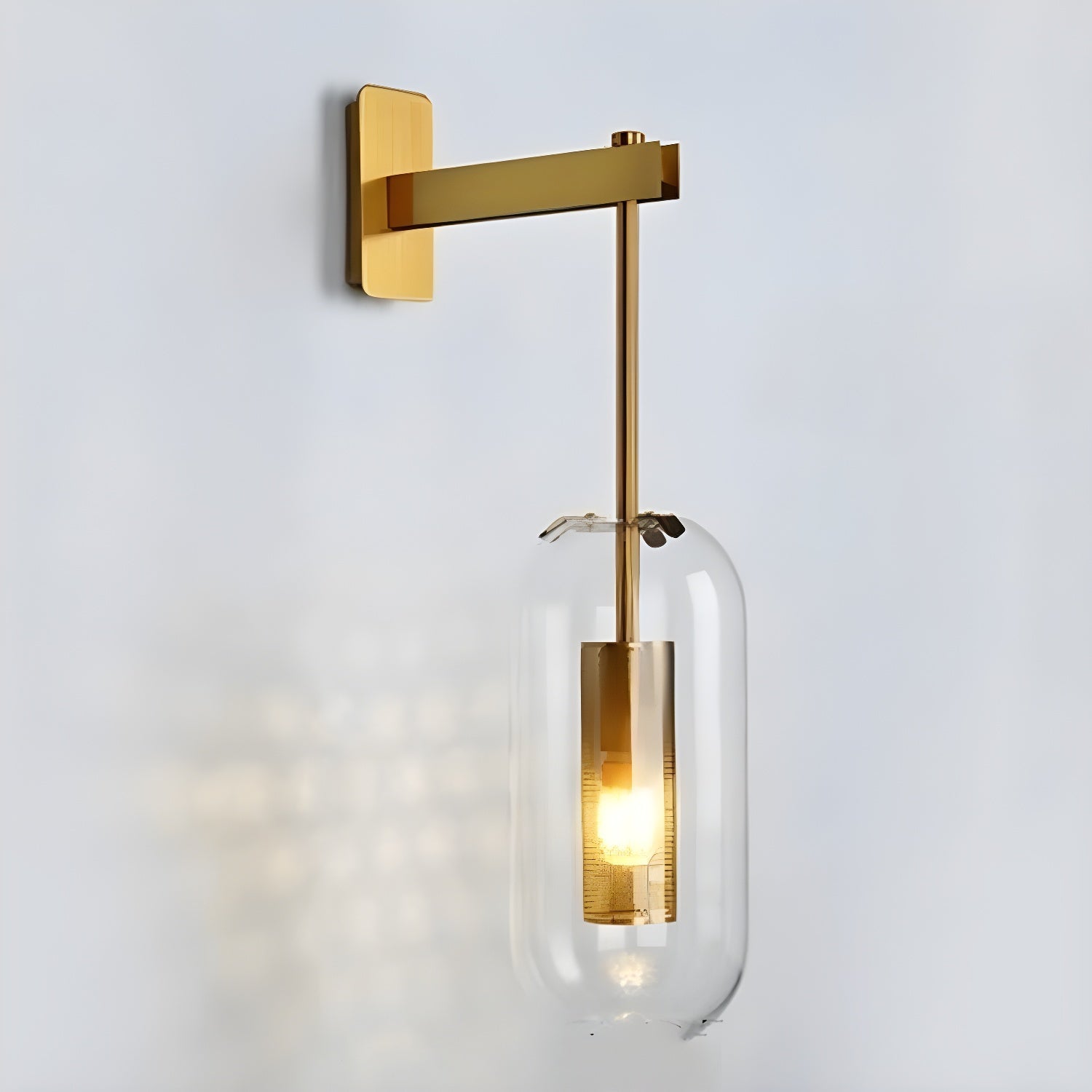 Copper-finish glass wall lamp casting soft light beside a doorway