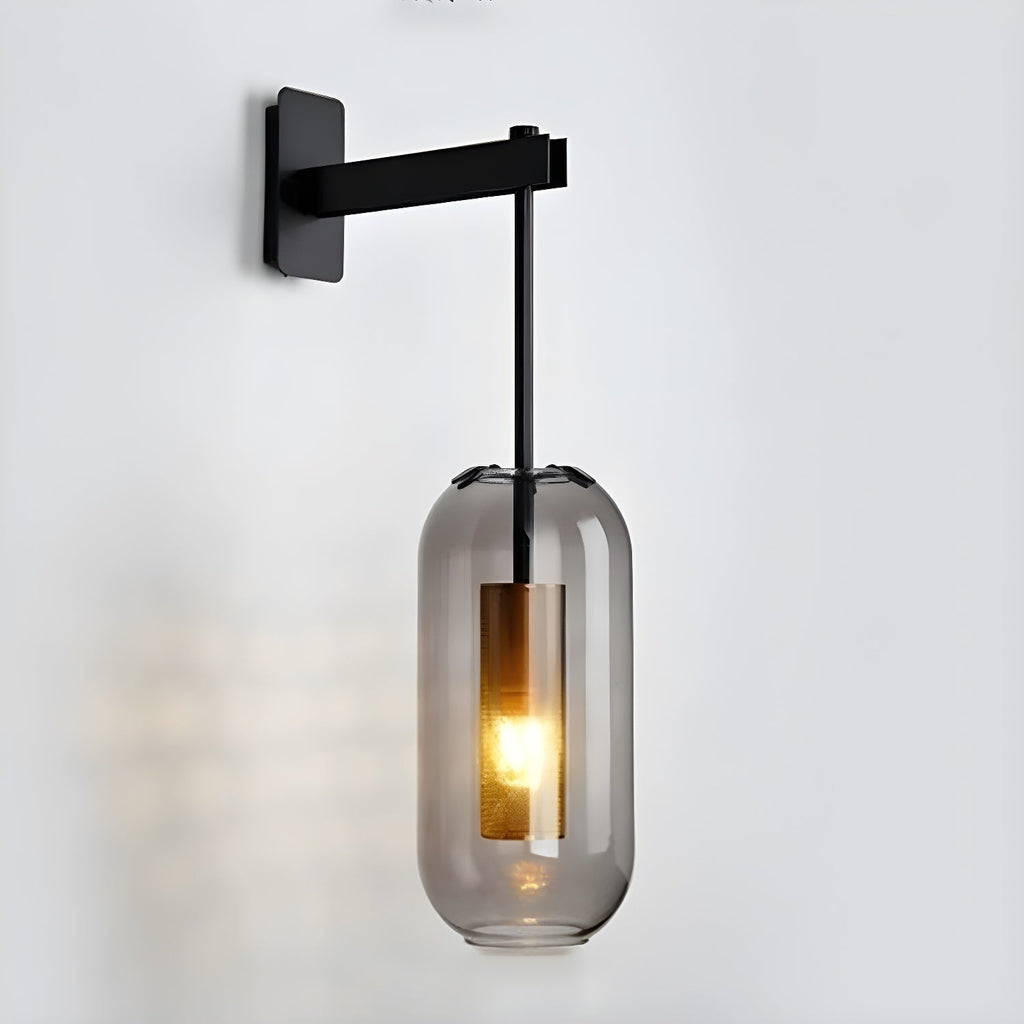 Wall lamp with glass shade detail highlighting its slim metal arm