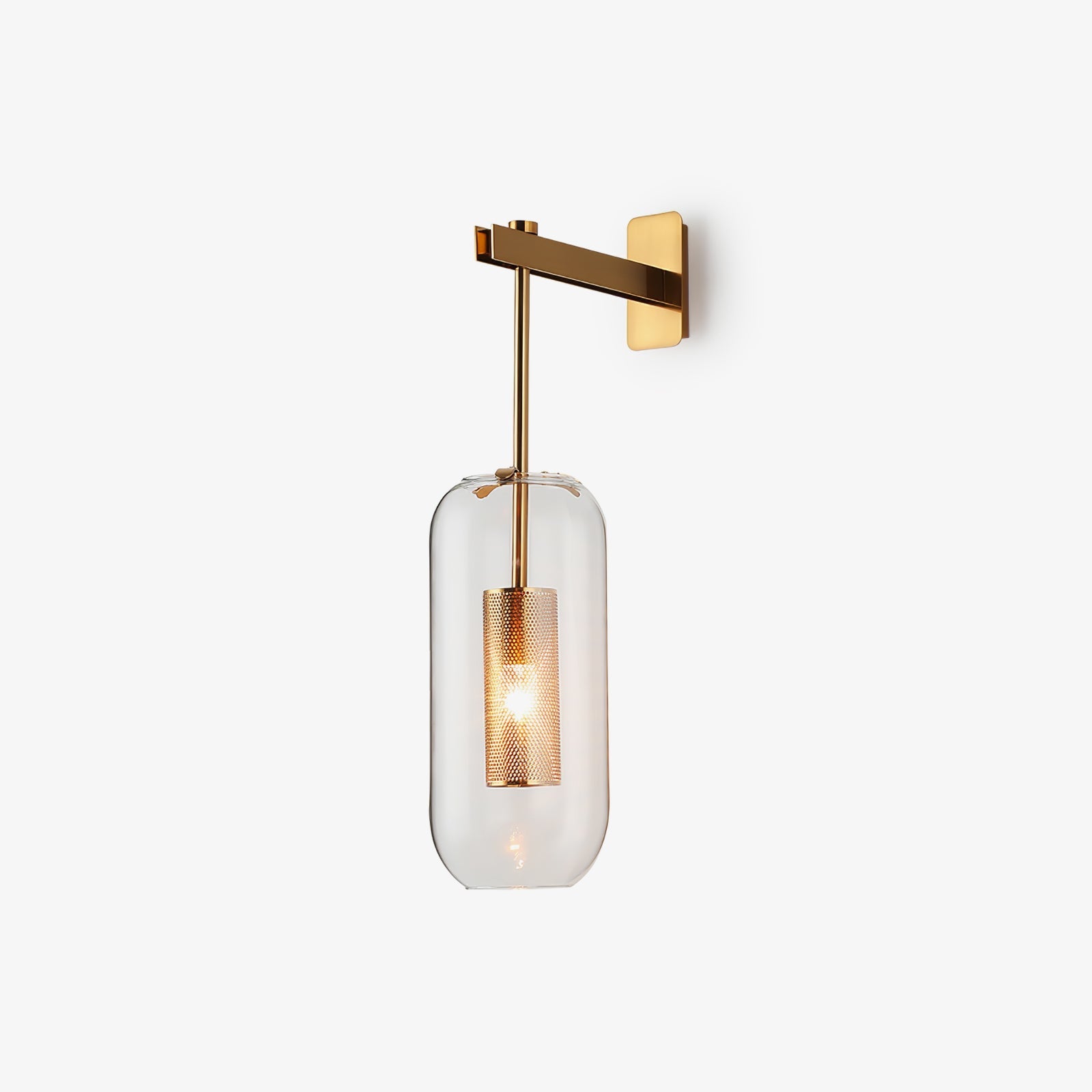 Wall-mounted glass lamp casting warm light against a pale wall