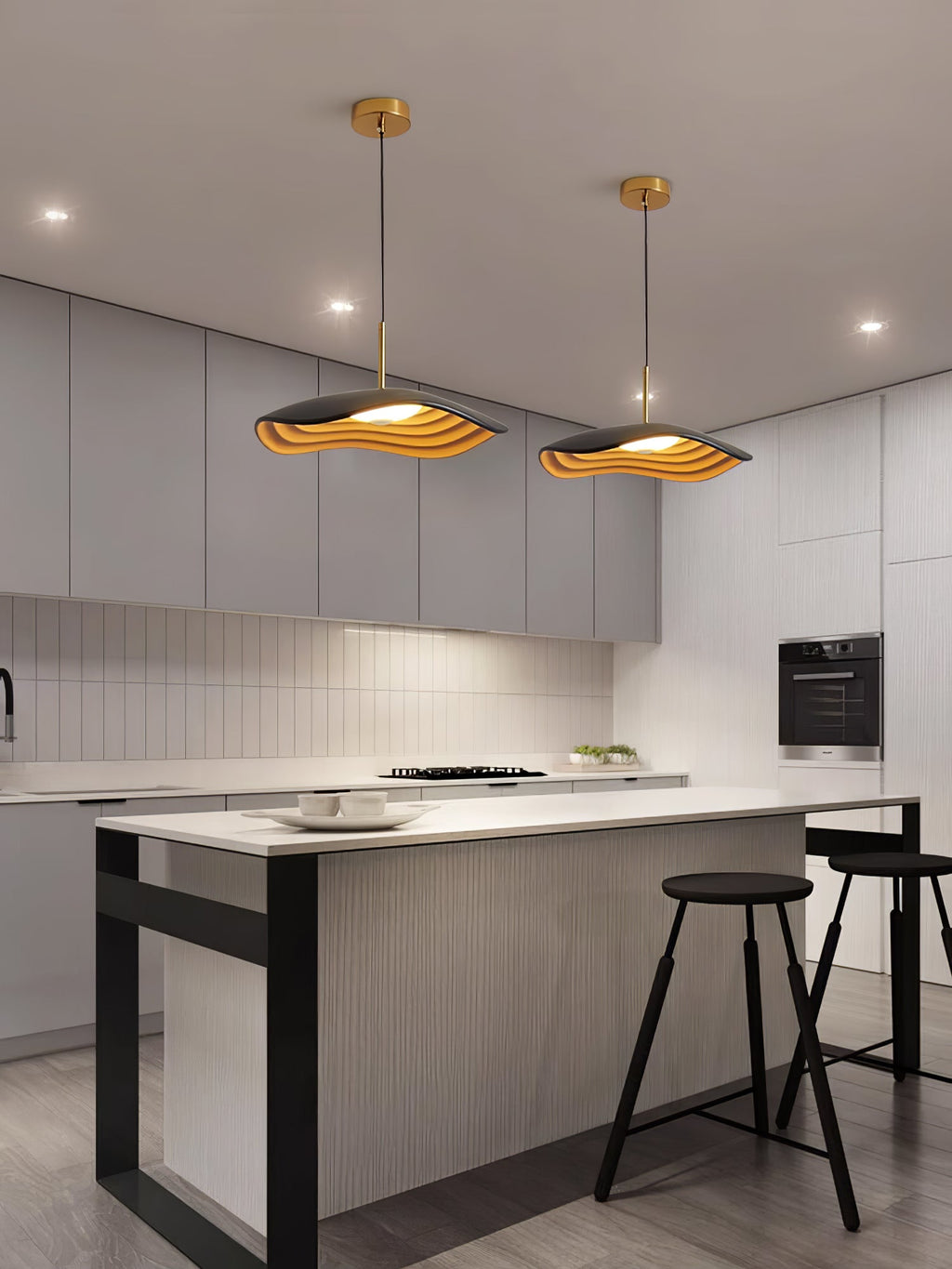 Pendant light glowing over a dining area with warm light