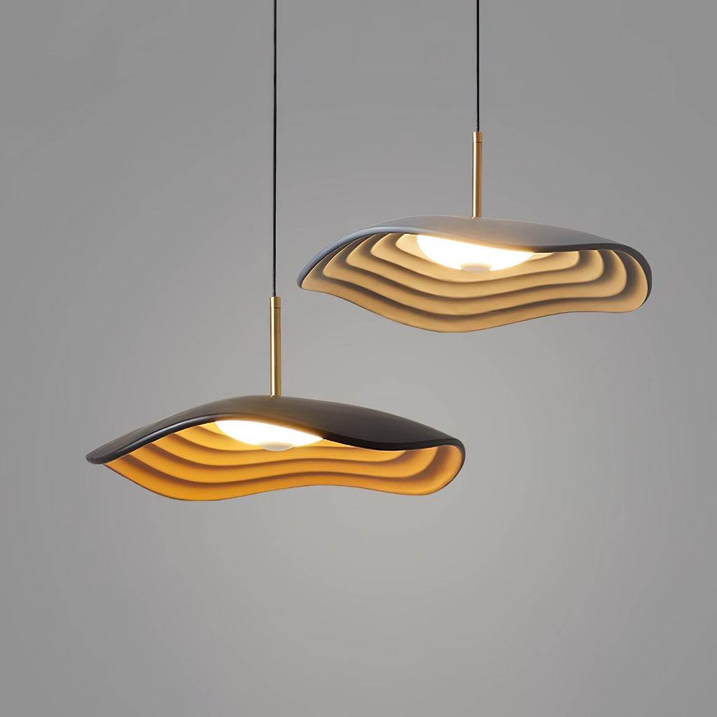 Disc pendant light with minimal form shown up close