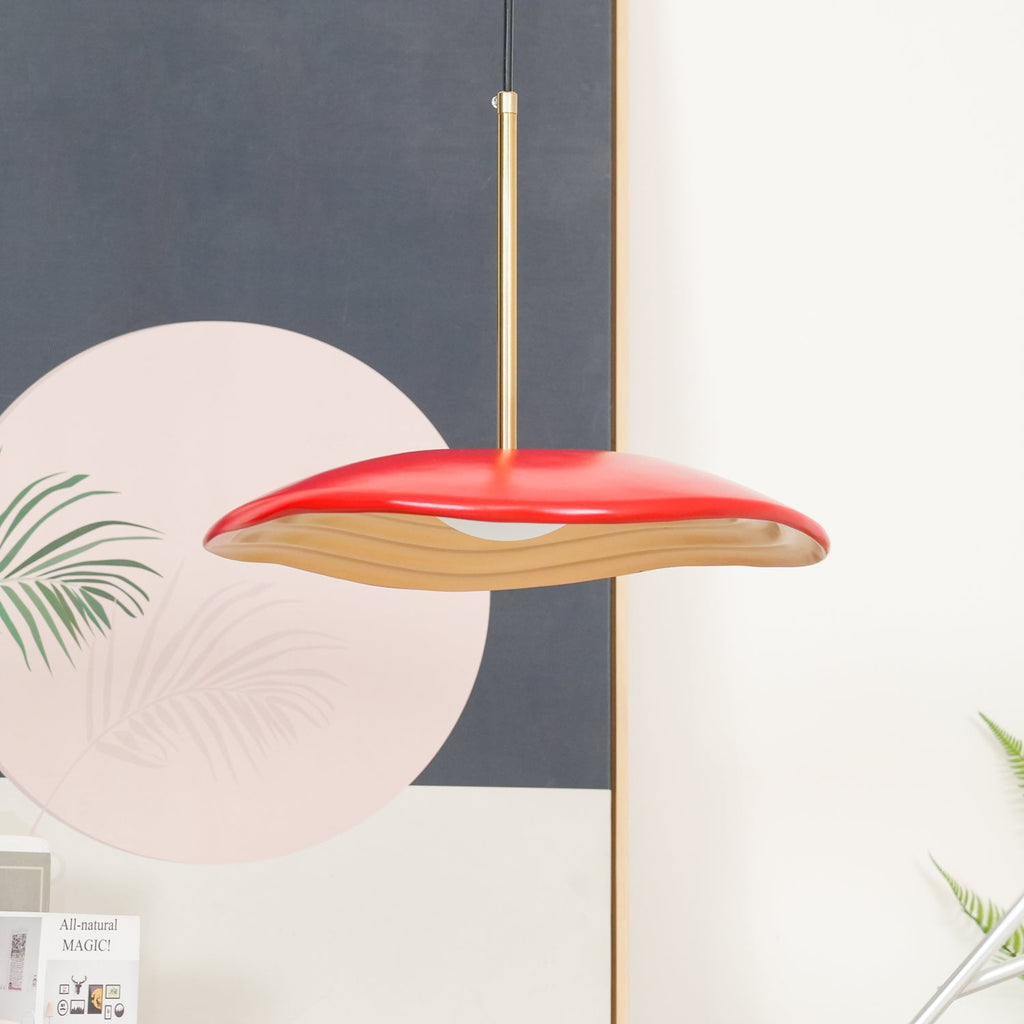 Pendant light with minimal disc design viewed from the side