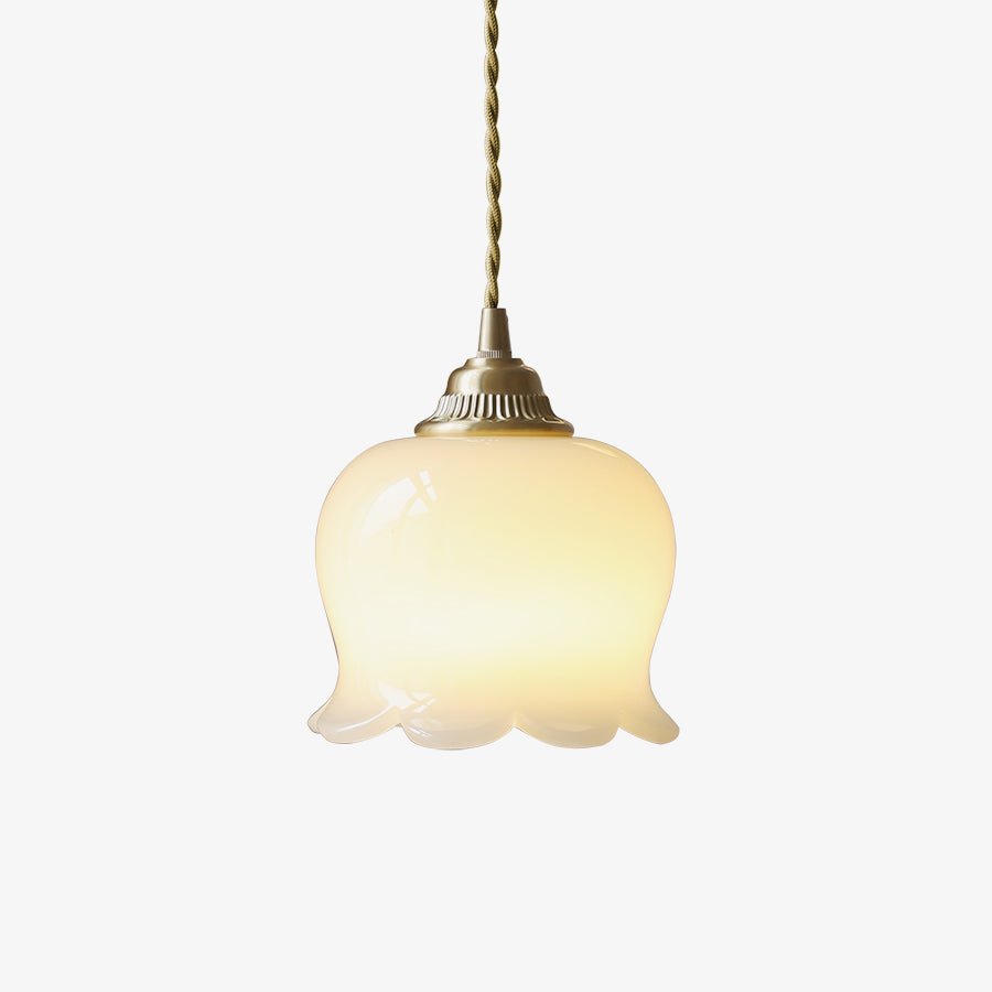 Brass flower pendant light with sculpted shade shown up close