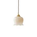 Brass flower pendant light with petal shade shown in full