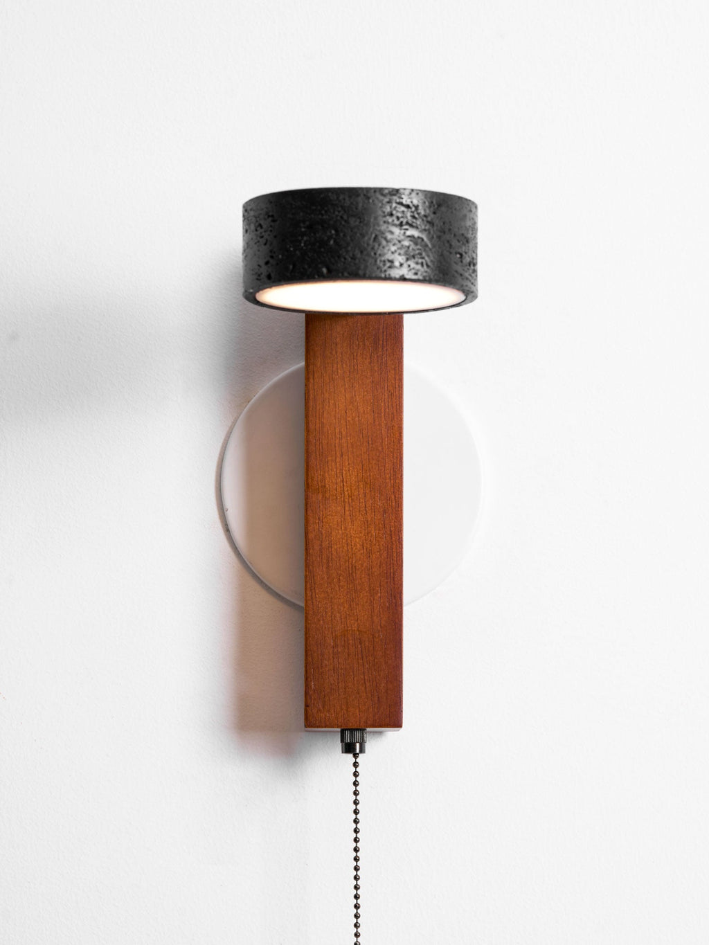 Front-on product shot of this Clérachic wall light on white, its pull chain just visible at the base.