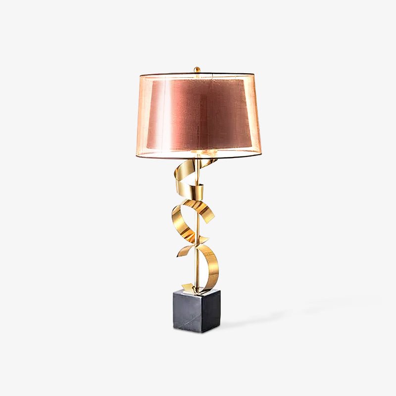 Clérachic table lamp with a twisted gold spiral stem and black marble base, shown on a plain white studio background.