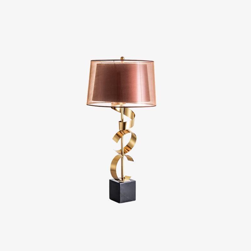 Clérachic table lamp shown full-length on a cream studio background, its drum shade rendered in a rosy copper tone.