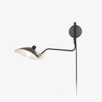 Versatile arm wall sconce shown straight on, arm fully extended