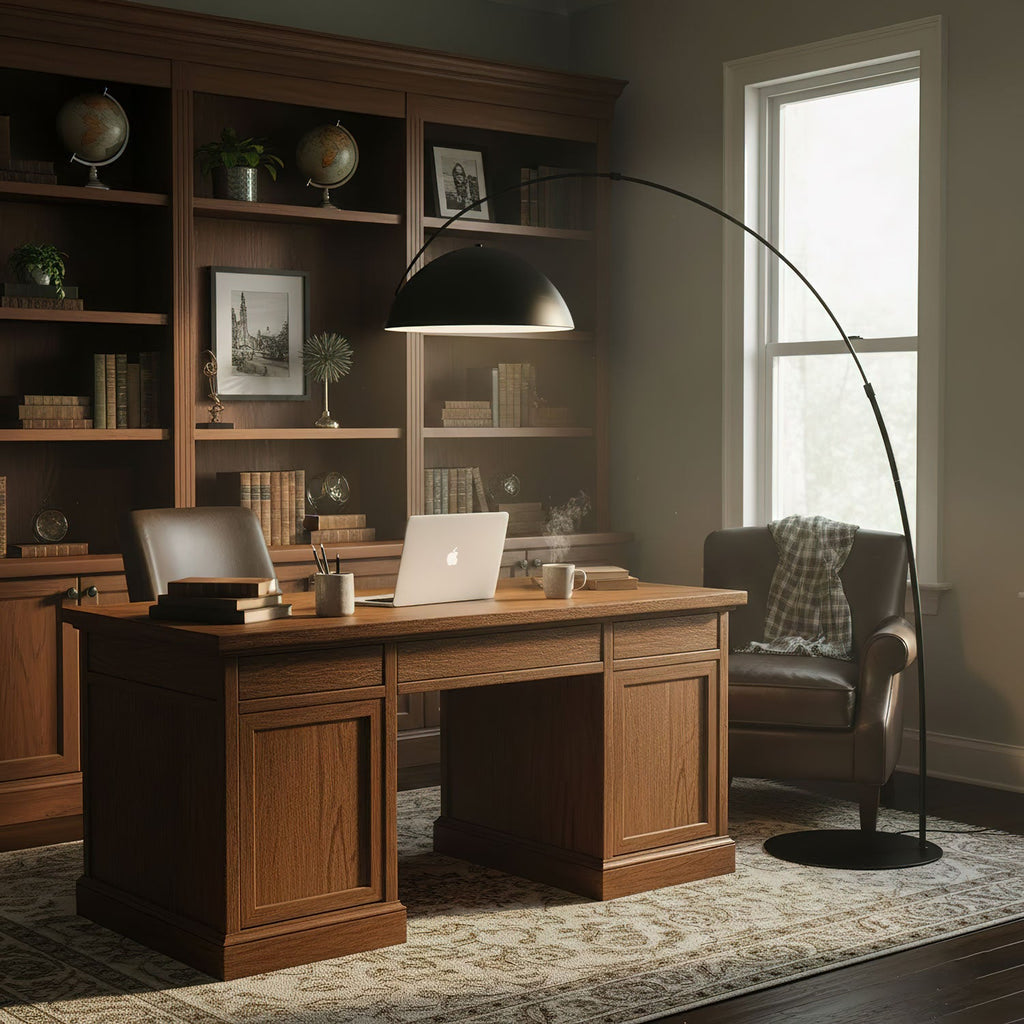 Verse arc floor lamp shade aimed over a seating area