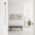 Wall lamp with vertical row of globes in a product illustration