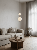 Globe pendant light installation detail at the ceiling