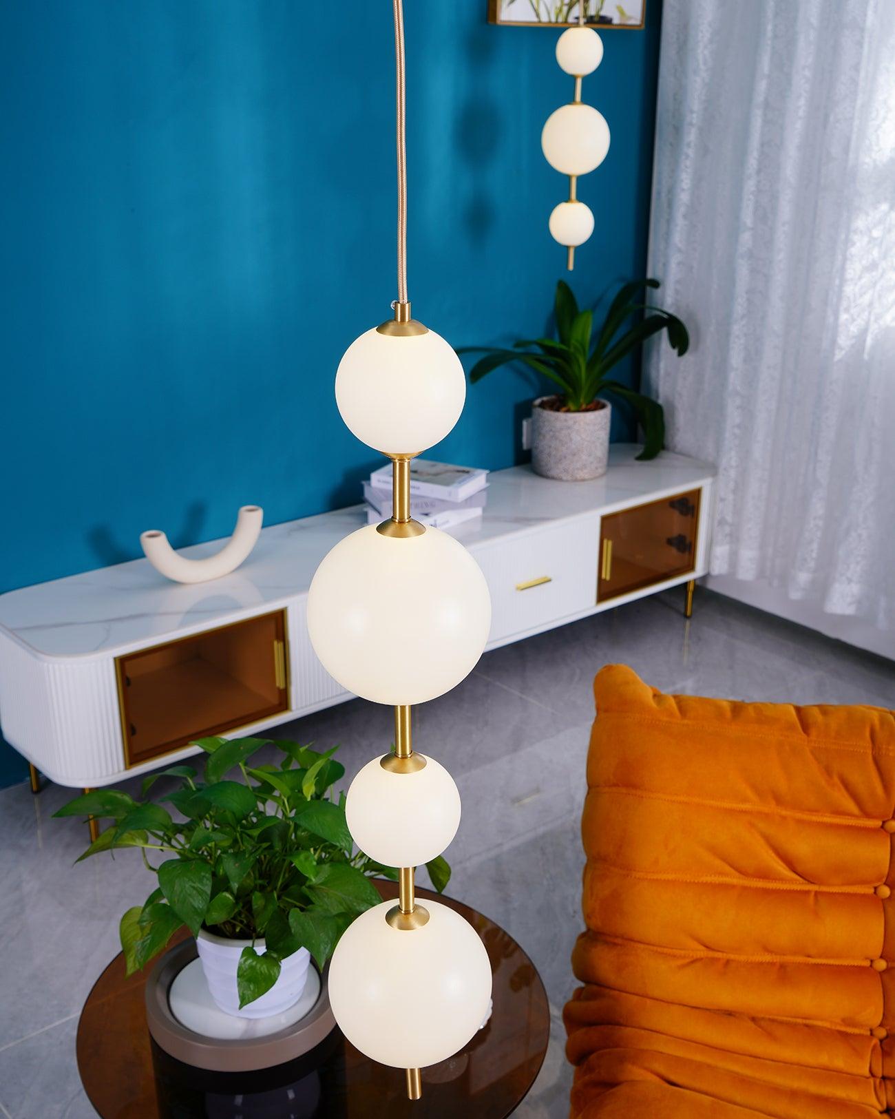 Globe pendant light shown in a bright kitchen setting