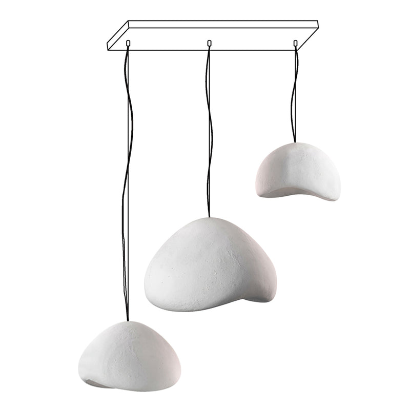 Wabi-sabi organic combination chandelier glowing softly