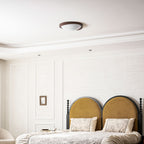 Wooden ceiling light shown upright on a white background